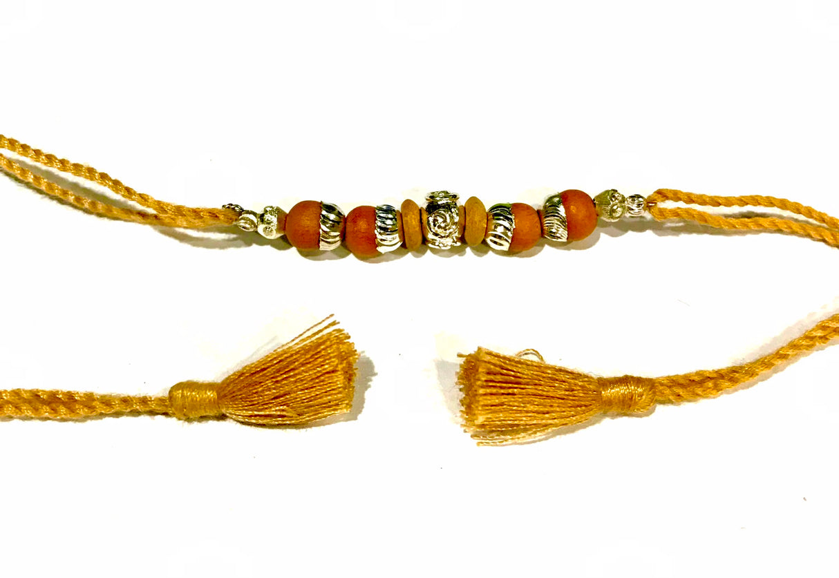 Wooden Bead Silver Accent Rakhi – Mustard Thread