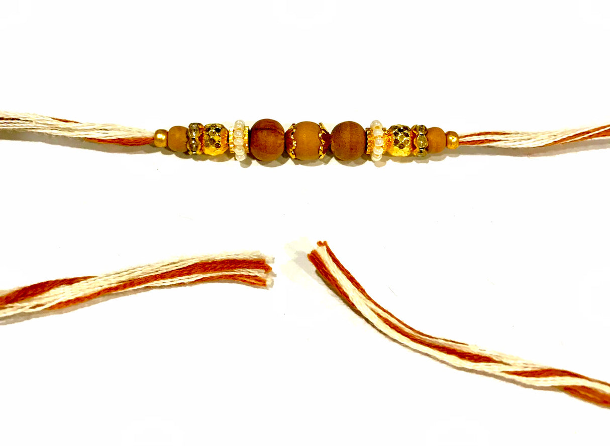 Traditional Wooden Bead Rakhi – Cream Thread