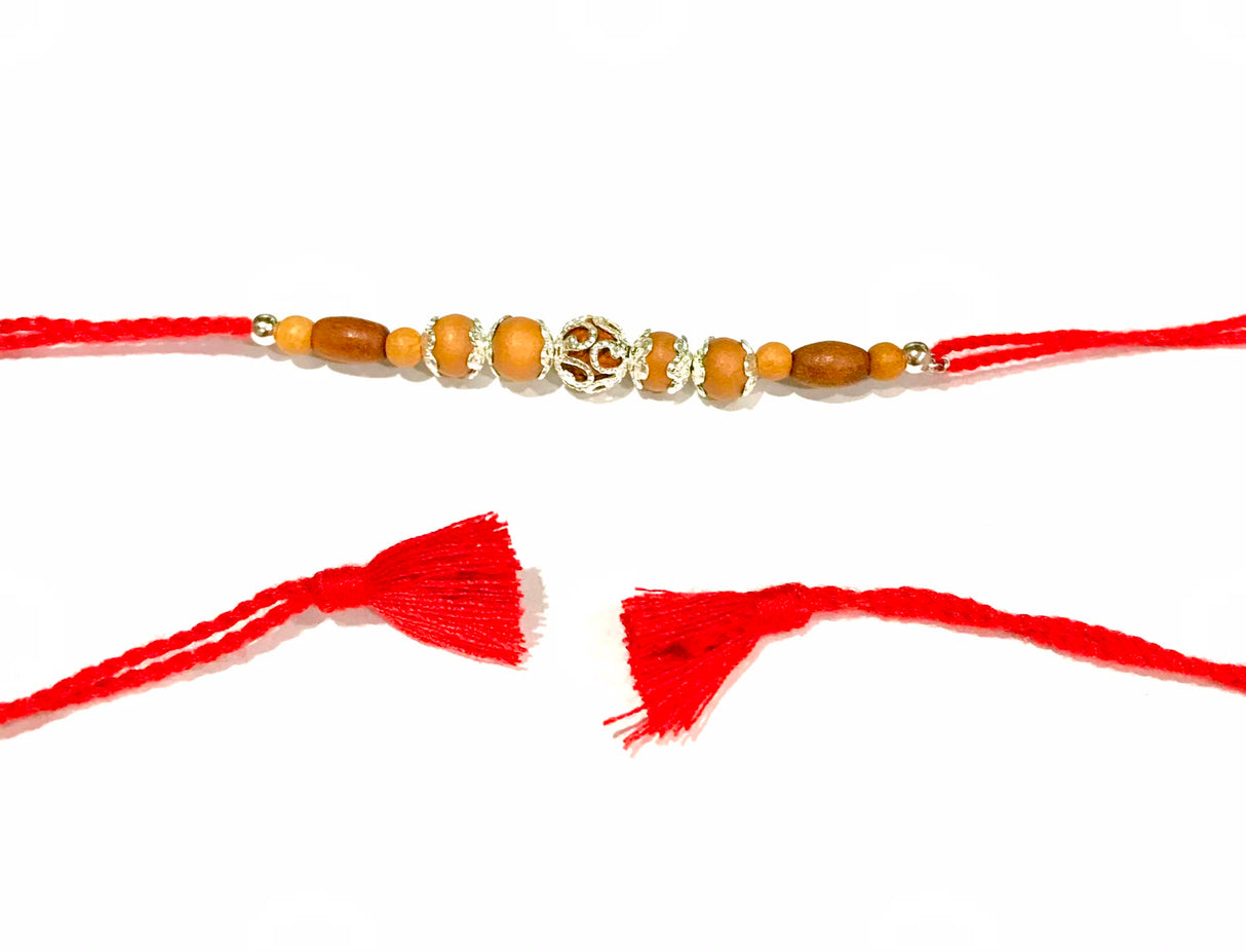 Silver Motif Wooden Bead Rakhi – Red Thread