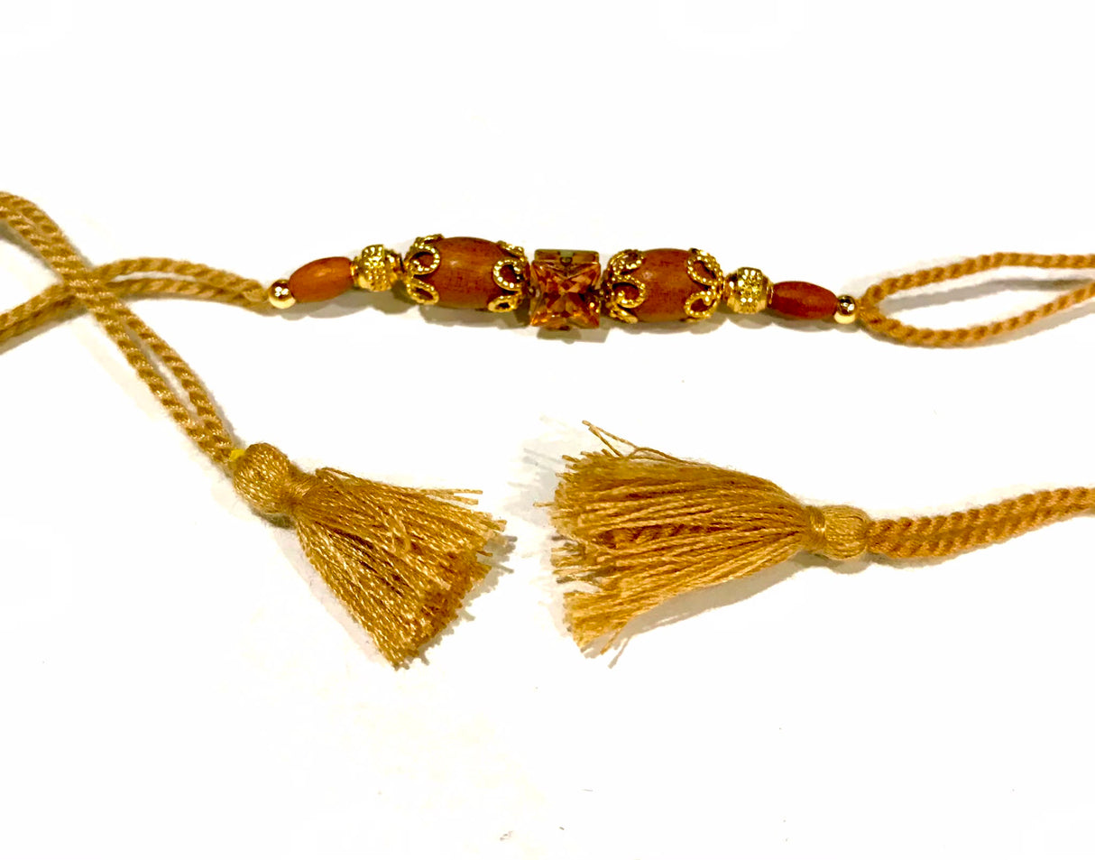 Golden Crystal Wooden Bead Rakhi