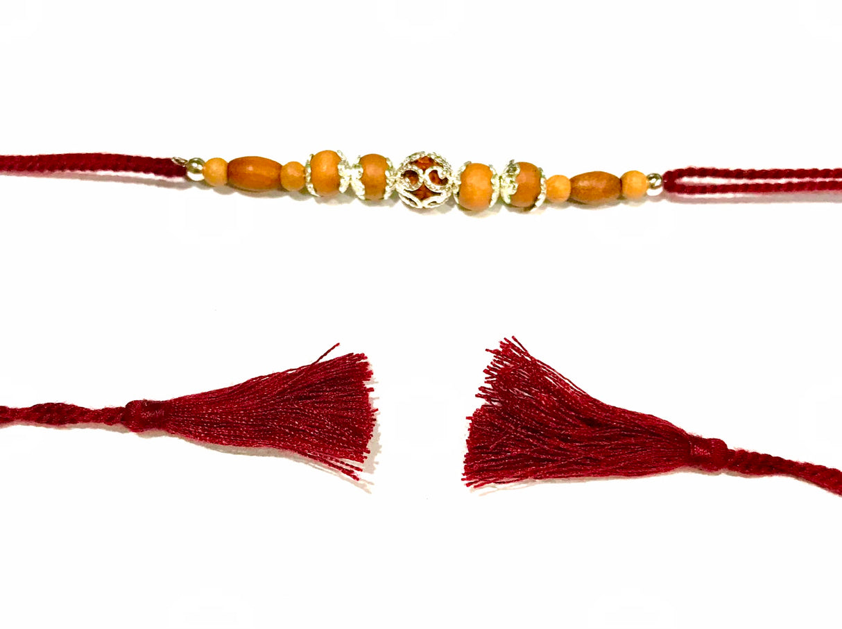 Silver Motif Wooden Bead Rakhi – Maroon Thread